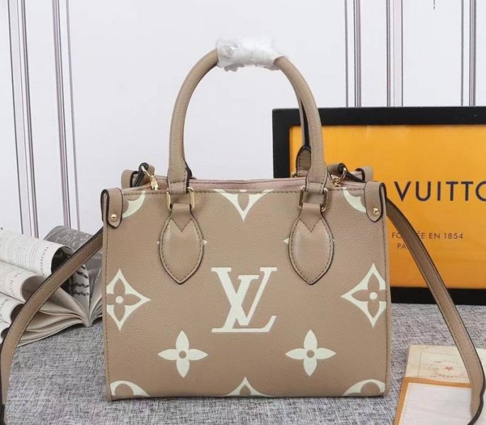 Replica Louis Vuitton Bicolor Monogram Empreinte Leather Onthego PM In Tourterelle Gray And Cream