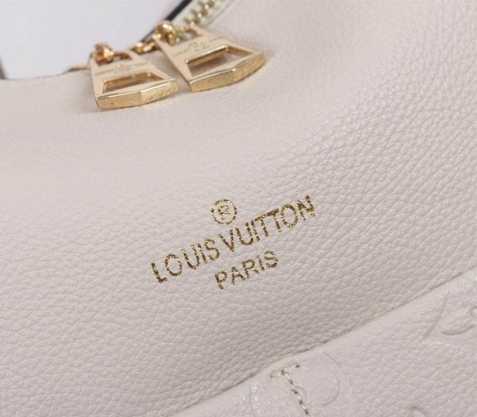 Replica Louis Vuitton Monogram Empreinte Leather Maida In Cream - Image 7
