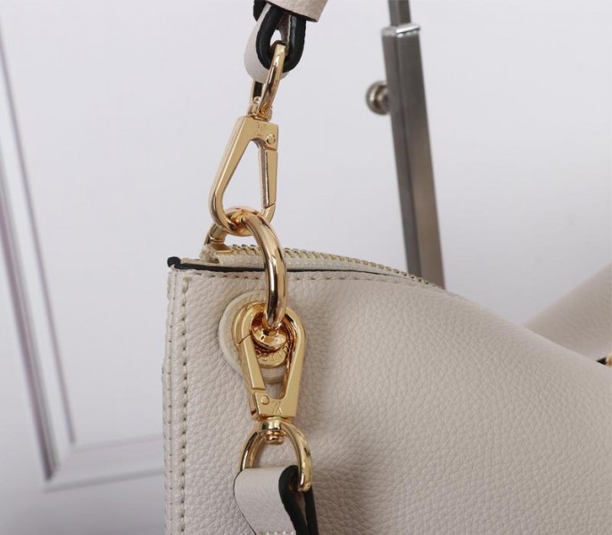 Replica Louis Vuitton Monogram Empreinte Leather Maida In Cream - Image 9