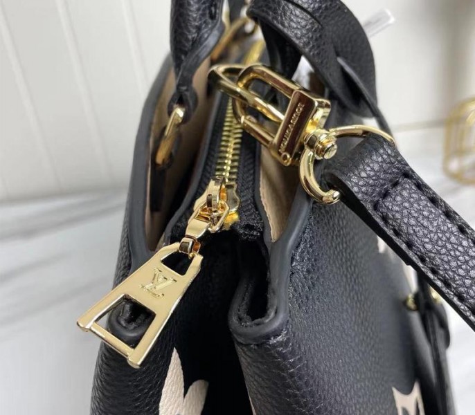 Replica Louis Vuitton Bicolor Monogram Empreinte Leather Petit Palais In Black And Beige - Image 7