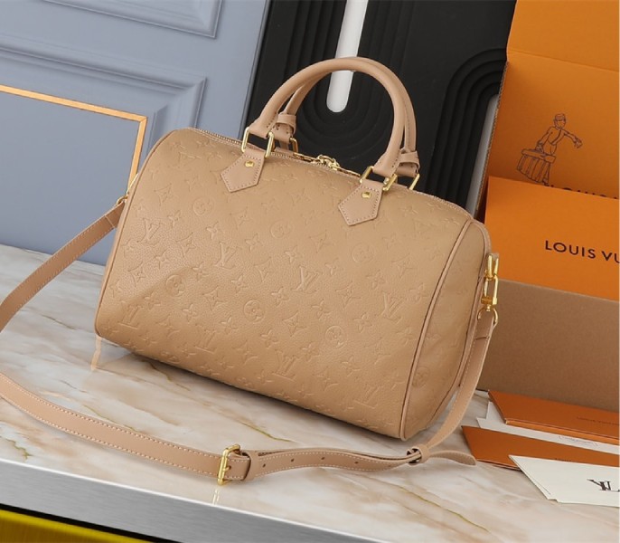 Replica Louis Vuitton Monogram Empreinte Speedy Soft 30 In Apricot - Image 2