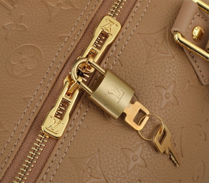 Replica Louis Vuitton Monogram Empreinte Speedy Soft 30 In Apricot - Image 5