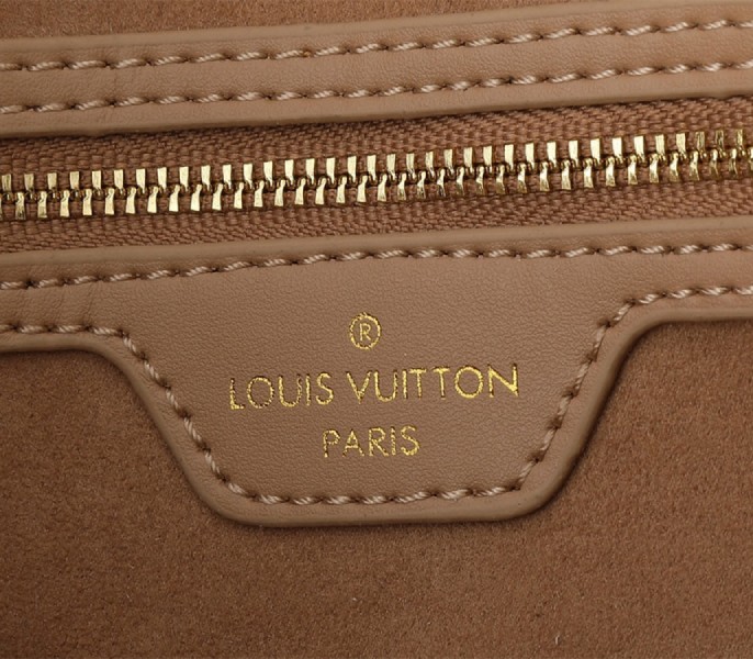 Replica Louis Vuitton Monogram Empreinte Speedy Soft 30 In Apricot - Image 9