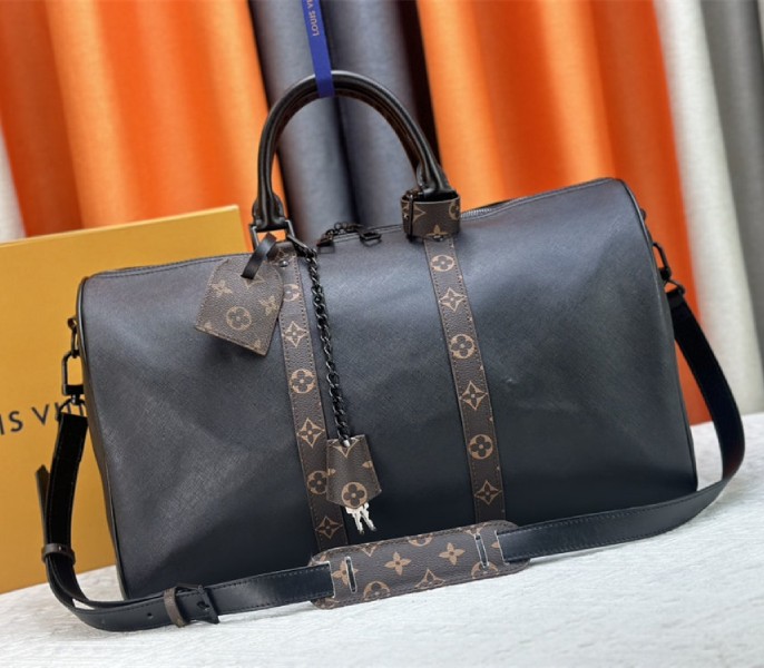 Replica Louis Vuitton Taiga Leather Keepall Bandouliere 45 In Black And Monogram Macassar Canvas