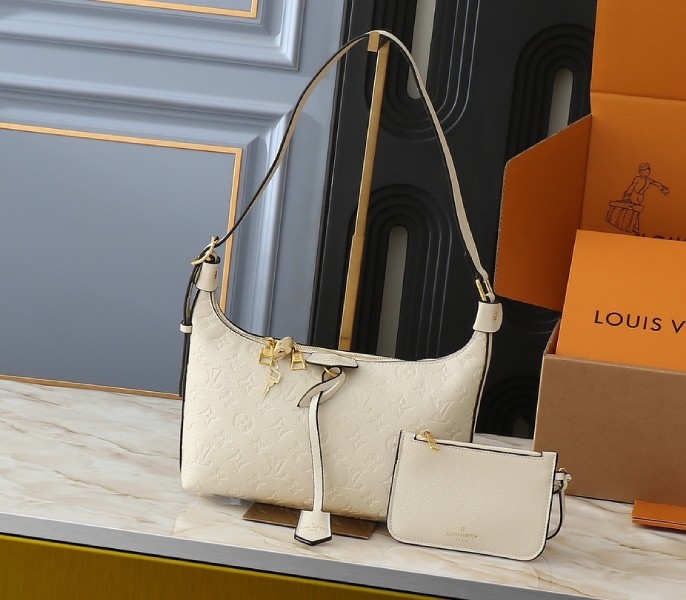 Replica Louis Vuitton Monogram Empreinte Sac Sport In Cream Beige M46609