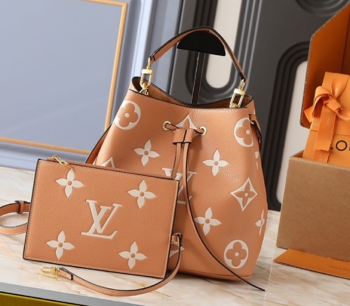Replica Louis Vuitton Bicolor Monogram Empreinte Leather NeoNoe MM In Arizona Beige And Cream