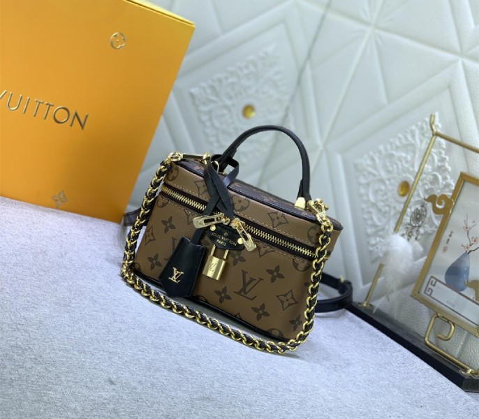 Replica Louis Vuitton Monogram Reverse Canvas Vanity Chain Pouch In Black - Image 2