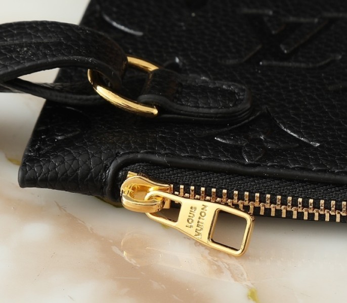 Replica Louis Vuitton Bicolor Monogram Empreinte Loop Hobo Bag In Black And Cream - Image 9